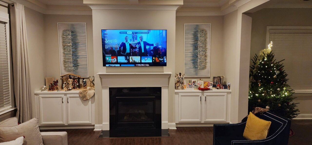 Professional tv wall mounting pineville nc featuring secure stud installation with toggle bolts and professional wire concealment in carolina place area