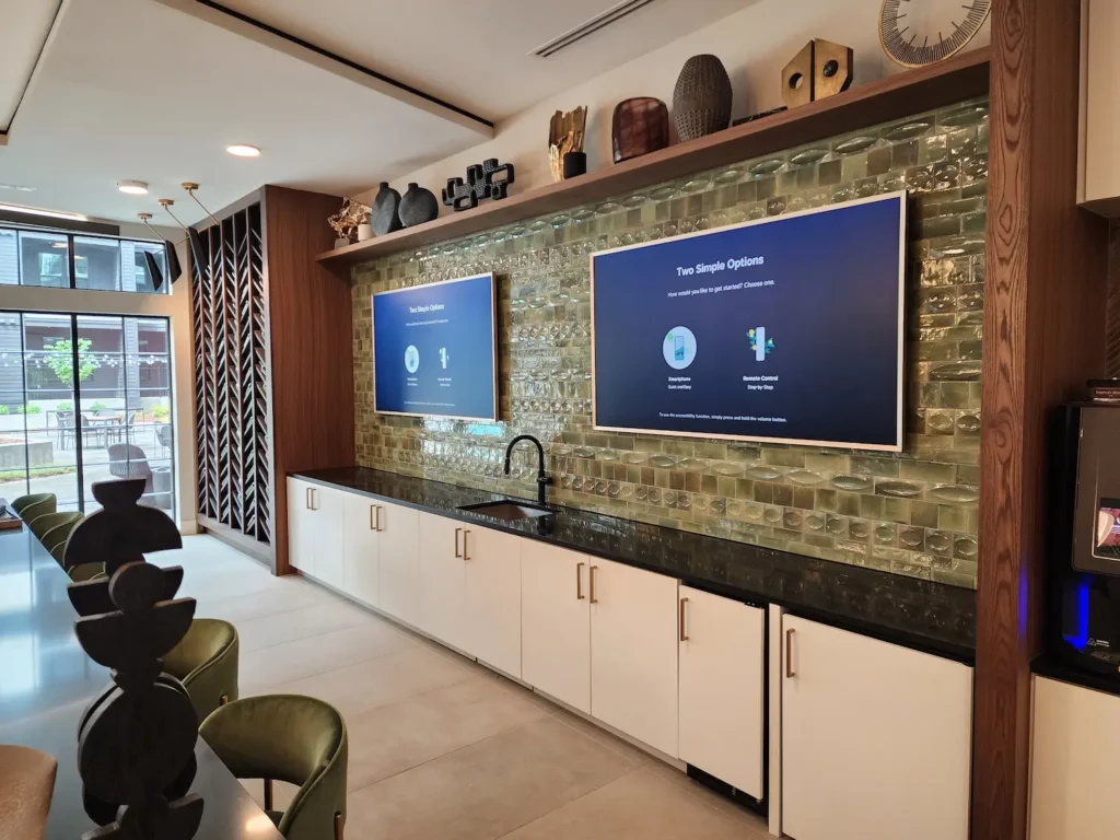 Frame TV mounted on brick fireplace Charlotte NC