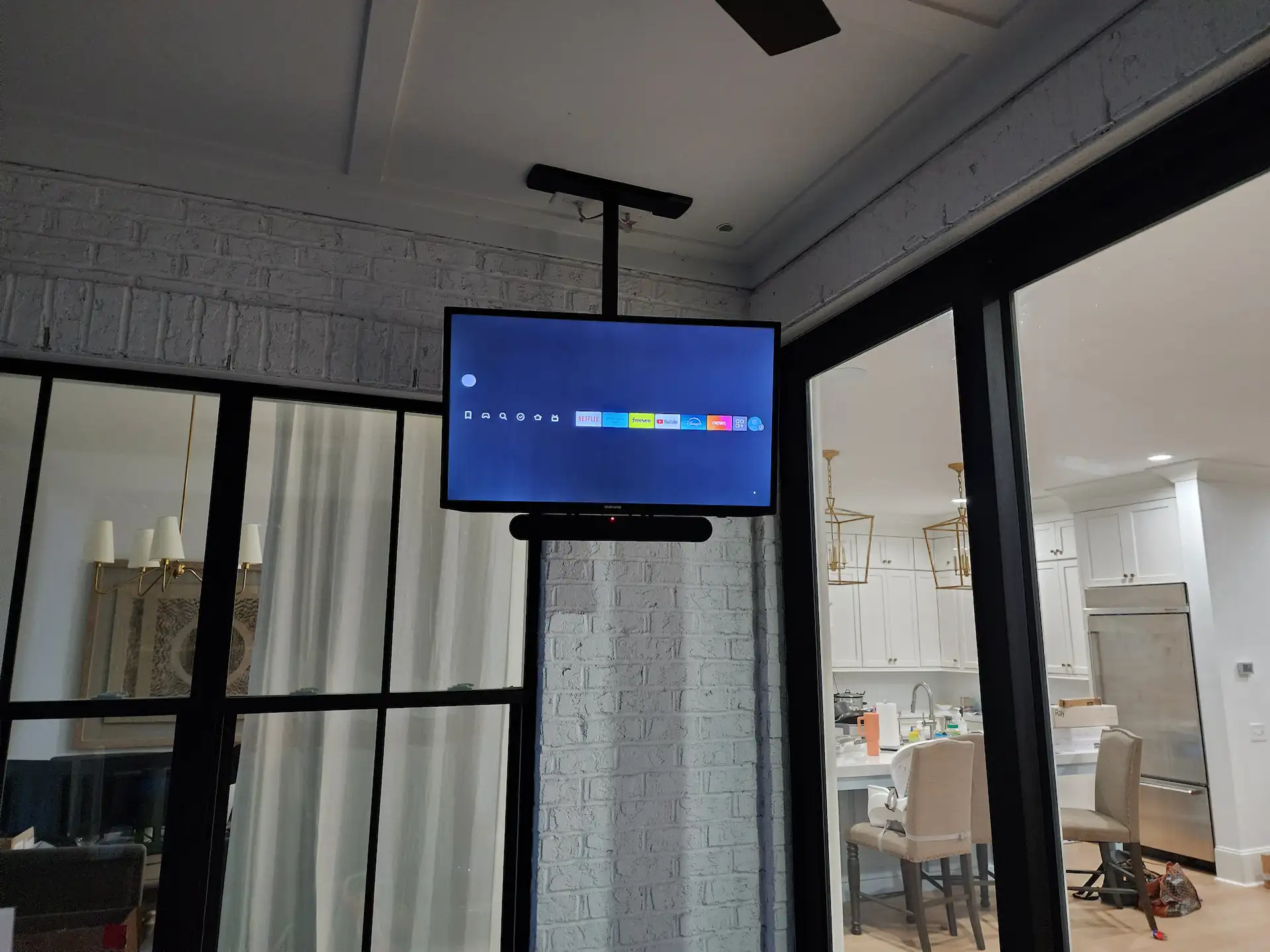 Wall-mounted tv with hidden wires in a charlotte living room by south charlotte services